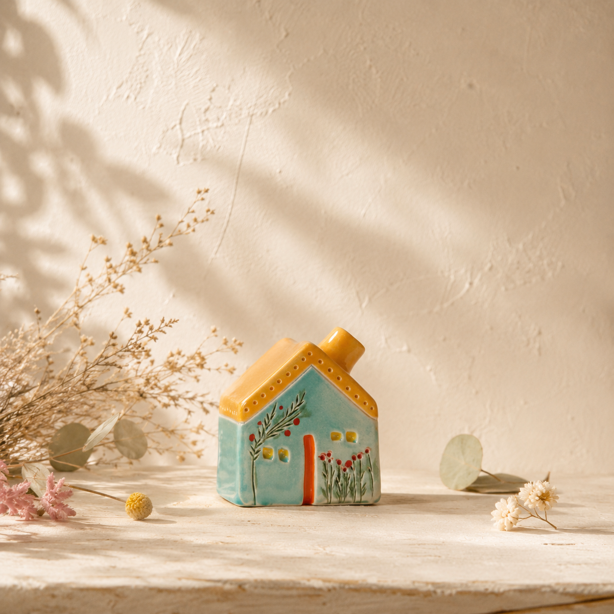 The Warmth-Keeper Houses ceramic pieces